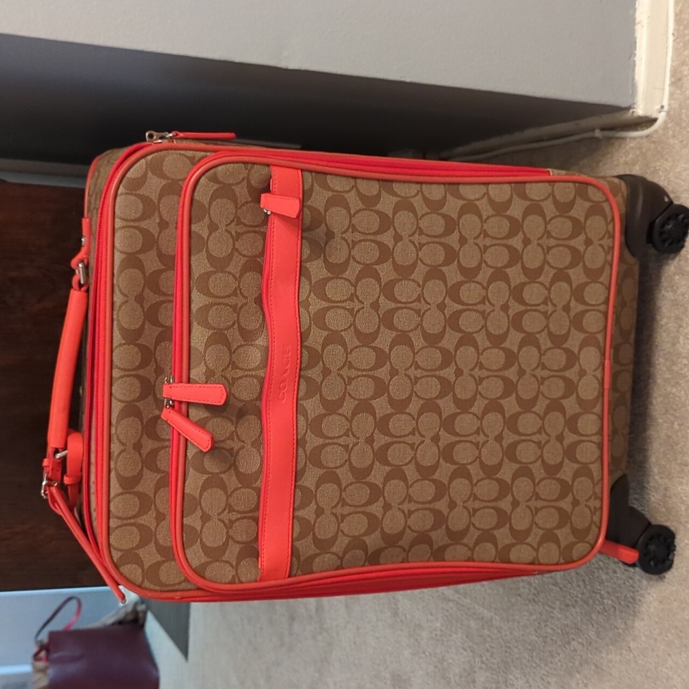 Coach 23" spinner suitcase